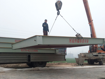 河南集源環(huán)?？萍加邢薰?x18m定額150噸數(shù)字地磅施工案例